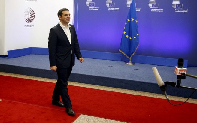 Greek Prime Minister Alexis Tsipras leaves the European Commission after a meeting ahead of a Eurozone emergency summit on Greece in Brussels, Belgium early June 23, 2015. A new Greek offer for a cash-for-reforms deal raised hopes of an agreement as euro zone leaders prepared for an emergency summit on Monday, with EU officials welcoming the proposals as a "good basis for progress" to avert a default by Athens. REUTERS/Charles Platiau