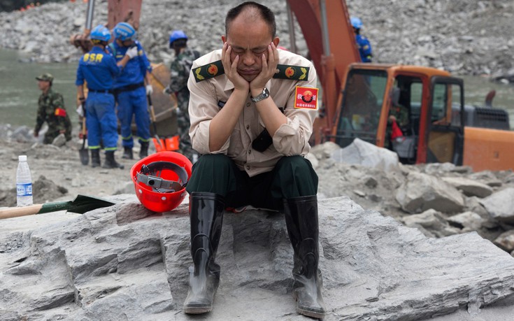 Χάνονται οι ελπίδες για επιζώντες στο χωριό της Κίνας που θάφτηκε στη λάσπη