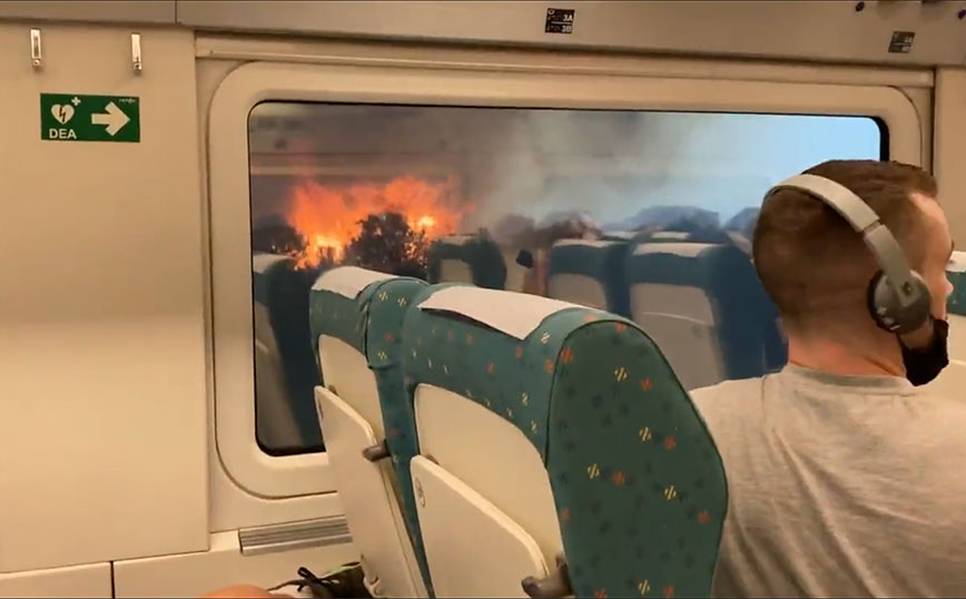 Σκηνές τρόμου στη Μαδρίτη: Τρένο περνάει δίπλα από μεγάλη φωτιά που καίει σε δάσος