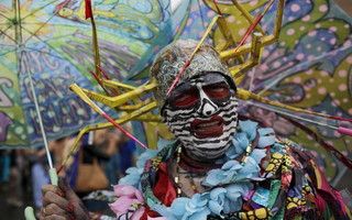 A participant takes part in the Mermaid Parade at Coney Island, in Brooklyn, New York, June 20, 2015. The annual parade, founded in 1983, seeks to bring mythology to life for residents, create confidence in the district and to allow artistic self-expression in public, according to the parade's website. REUTERS/Eduardo Munoz