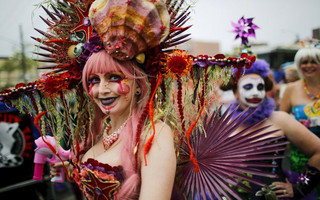 Participants take part in the Mermaid Parade on the streets of Coney Island in Brooklyn, New York June 20, 2015. The annual parade, founded in 1983, seeks to bring mythology to life for residents, create confidence in the district and to allow artistic self-expression in public, according to the parade's website. REUTERS/Eduardo Munoz