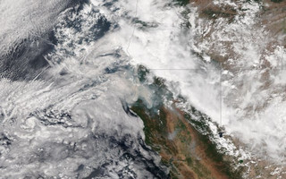 Smoke from a wildfire burning in northern California is seen in a NASA image taken by the Suomi NPP satellite around 17:23 ET (21:23 GMT) August 2, 2015. The blaze, dubbed the Rocky Fire, has scorched some 62,000 acres and destroyed more than 50 structures since erupting last week in the canyons and foothills along the inland flanks of California's North Coast Ranges, quadrupling in size over the weekend.  Picture taken August 2, 2015.  REUTERS/NASA/Handout  THIS IMAGE HAS BEEN SUPPLIED BY A THIRD PARTY. IT IS DISTRIBUTED, EXACTLY AS RECEIVED BY REUTERS, AS A SERVICE TO CLIENTS. FOR EDITORIAL USE ONLY. NOT FOR SALE FOR MARKETING OR ADVERTISING CAMPAIGNS