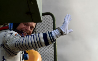 Denmark's astronaut Andreas Mogensen from the European Space Agency waves as he boards the Soyuz TMA-18M spacecraft at the Russian-leased Baikonur cosmodrome early September 2, 2015.  REUTERS/Kirill Kudryavtsev/Pool