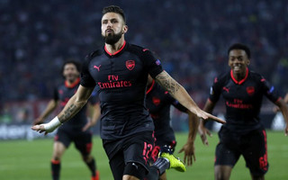 Arsenal's Olivier Giroud celebrates scoring his side's first goal of the game during the Europa League group H soccer match between Red Star and Arsenal on the stadium Rajko Mitic in Belgrade, Serbia, Thursday, Oct. 19, 2017. (AP Photo/Darko Vojinovic)