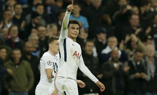 Tottenham's Dele Alli celebrates after scoring his side's opening goal during a Champions League Group H soccer match between Tottenham Hotspurs and Real Madrid at the Wembley stadium in London, Wednesday, Nov. 1, 2017. (AP Photo/Tim Ireland)