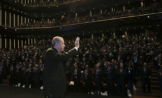 Turkey's President Recep Tayyip Erdogan acknowledges the audience as he arrives to deliver a speech at a tourism council in Ankara, Turkey, Wednesday, Nov. 1, 2017. (Pool Photo via AP) Turkey's President Recep Tayyip Erdogan acknowledges the audience as he arrives to deliver a speech at a tourism council in Ankara, Turkey, Wednesday, Nov. 1, 2017. (Pool Photo via AP)