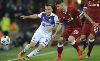 Liverpool's Alberto Moreno, right, challenges Maribor's Dino Hotic, left, during the Champions League Group E soccer match between Liverpool and Maribor at Anfield, Liverpool, England, Wednesday Nov. 1, 2017. (AP Photo/Rui Vieira)