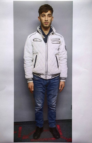 The search photo provided by Wiesbaden, western Germany, police shows 20-years-old Iraqi Ali Basar who is suspected of raping and killing a 14-years-old girl. (Polizei Wiesbaden via AP)