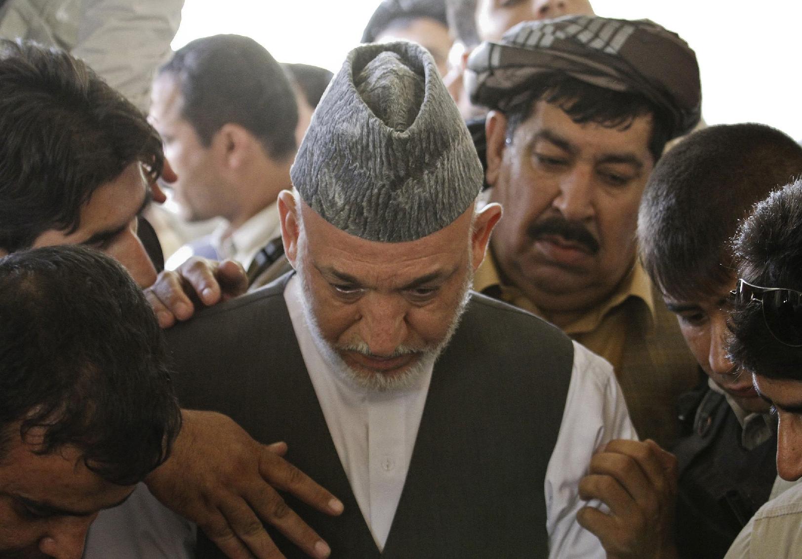 Επίθεση χωρίς θύματα στην κηδεία του αδελφού του Αφγανού προέδρου