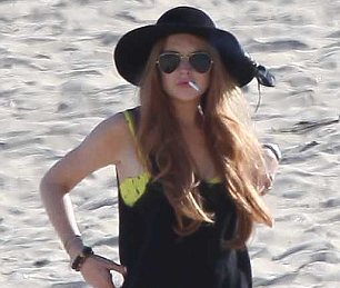 Ήλιος, θάλασσα και… μασάζ για την Lindsay Lohan