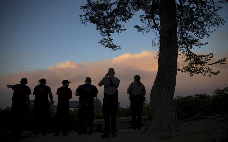 Sequoia & Kings Canyon National Park rangers and firefighters monitor the so-called "Rough Fire" in the Sierra National Forest, California