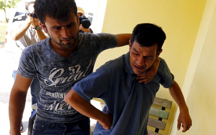 Abdullah Kurdi, father of three-year old Aylan Kurdi, is comforted by an unidentified man as he leaves a morgue in Mugla Abdullah Kurdi, father of three-year old Aylan Kurdi, is comforted by an unidentified man as he leaves a morgue in Mugla