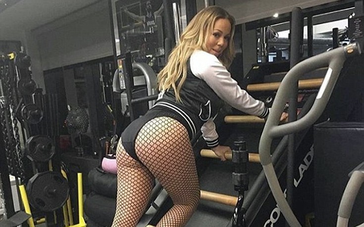 Η Mariah Carey γυμνάζεται με μαύρο κορμάκι και διχτυωτό καλσόν