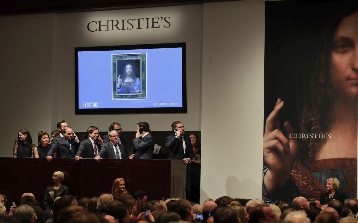 CORRECTS PRICE - Bidding representatives wait on phones for instructions from bidders for Leonardo da Vinci's "Salvator Mundi" at Christie's, Wednesday, Nov. 15, 2017, in New York. The painting sold for $450 million. (AP Photo/Julie Jacobson) CORRECTS PRICE - Bidding representatives wait on phones for instructions from bidders for Leonardo da Vinci's "Salvator Mundi" at Christie's, Wednesday, Nov. 15, 2017, in New York. The painting sold for $450 million. (AP Photo/Julie Jacobson)