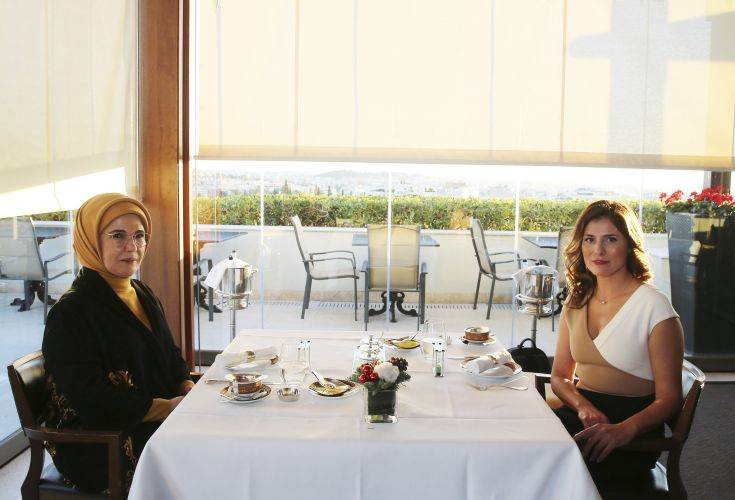 Betty Baziana, right, partner of Greece's Prime Minister Alexis Tsipras, meets with Emine Erdogan, wife of Turkey's President Recep Tayyip Erdogan, in Athens, Thursday, Dec. 7, 2017. Erdogan is in Greece on a two-day official visit. (Pool via AP)