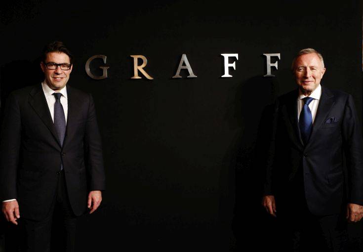 FILE - In this Monday, May 21, 2012 file photo, Graff Diamonds Founder and Chairman Laurence Graff, right, and CEO Francois Graff stands before attending an IPO roadshow in Hong Kong. The London jeweler said Thursday, May 31, 2012 in a brief statement that it's postponing plans to go public in the southern Chinese financial center because of the recent downturn in global financial markets. Graff Diamonds would have been the latest in a line of foreign luxury brands to sell shares in Hong Kong. (AP Photo/Vincent Yu, File) FILE - In this Monday, May 21, 2012 file photo, Graff Diamonds Founder and Chairman Laurence Graff, right, and CEO Francois Graff stands before attending an IPO roadshow in Hong Kong. The London jeweler said Thursday, May 31, 2012 in a brief statement that it's postponing plans to go public in the southern Chinese financial center because of the recent downturn in global financial markets. Graff Diamonds would have been the latest in a line of foreign luxury brands to sell shares in Hong Kong. (AP Photo/Vincent Yu, File)
