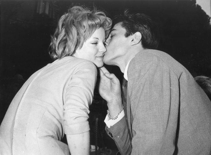 Romy Schneider with Alain Delon at the villa of Herbert Blatzheim, Schneider's adoptive father, in Morcote near Lugano after their engagement, March 22, 1955. (AP-photo)