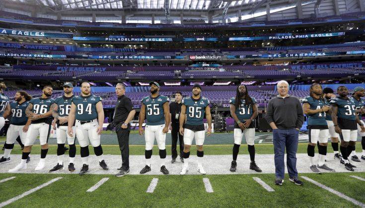 Philadelphia Eagles owner Jeffrey Lurie, front right, stands with players as they prepare for a walk through for the NFL Super Bowl 52 football game at U.S. Bank Stadium, Saturday, Feb. 3, 2018, in Minneapolis. Philadelphia is scheduled to face the New England Patriots Sunday. (AP Photo/Eric Gay) Philadelphia Eagles owner Jeffrey Lurie, front right, stands with players as they prepare for a walk through for the NFL Super Bowl 52 football game at U.S. Bank Stadium, Saturday, Feb. 3, 2018, in Minneapolis. Philadelphia is scheduled to face the New England Patriots Sunday. (AP Photo/Eric Gay)