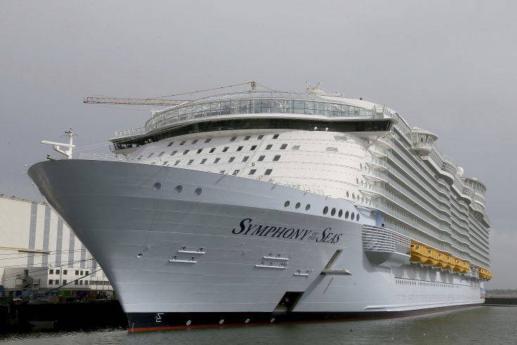 The Symphony of the Seas docks at Saint Nazaire port, western France, Friday, March 23, 2018. Royal Caribbean International took delivery of the much-awaited, 228,081-ton Symphony of the Seas from the French shipyard STX. Harmony of the Seas is the world's largest cruise ship. (AP Photo/David Vincent) The Symphony of the Seas docks at Saint Nazaire port, western France, Friday, March 23, 2018. Royal Caribbean International took delivery of the much-awaited, 228,081-ton Symphony of the Seas from the French shipyard STX. Harmony of the Seas is the world's largest cruise ship. (AP Photo/David Vincent)