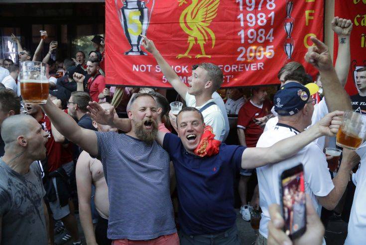 Liverpool supporters gather in Kiev, Ukraine, Friday, May 25, 2018. Supporters were gathering in Kiev ahead of the Champions League final soccer match between Real Madrid and Liverpool on Saturday May 26. (AP Photo/Efrem Lukatsky) Liverpool supporters gather in Kiev, Ukraine, Friday, May 25, 2018. Supporters were gathering in Kiev ahead of the Champions League final soccer match between Real Madrid and Liverpool on Saturday May 26. (AP Photo/Efrem Lukatsky)