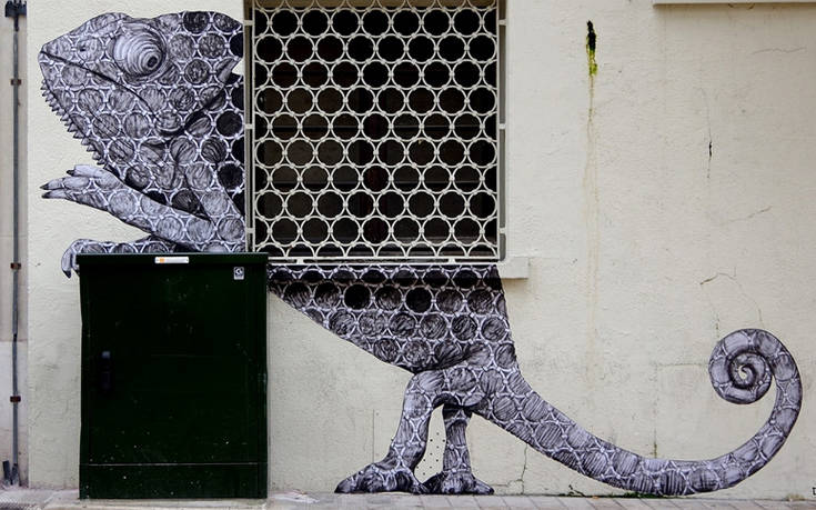 Ο καλλιτέχνης που με χαρτί και μελάνι κάνει ενέσεις χιούμορ στους τοίχους του Παρισιού