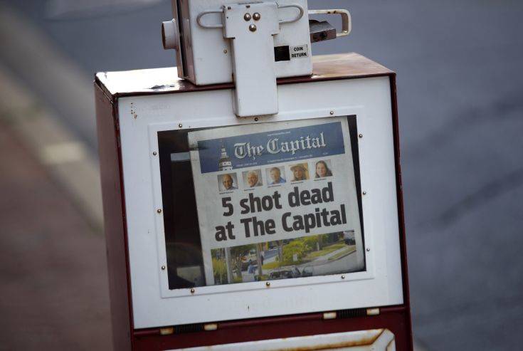 A Capital Gazette newspaper rack displays the day's front page, Friday, June 29, 2018, in Annapolis, Md. A man armed with smoke grenades and a shotgun attacked journalists in the newspaper's building Thursday, killing several people before police quickly stormed the building and arrested him, police and witnesses said. (AP Photo/Patrick Semansky) A Capital Gazette newspaper rack displays the day's front page, Friday, June 29, 2018, in Annapolis, Md. A man armed with smoke grenades and a shotgun attacked journalists in the newspaper's building Thursday, killing several people before police quickly stormed the building and arrested him, police and witnesses said. (AP Photo/Patrick Semansky)
