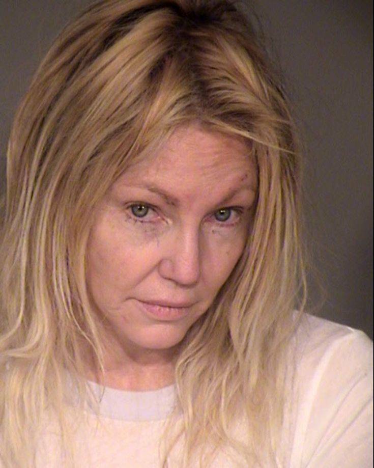 This undated booking photo provided by the Ventura County Sheriff's Office shows actress Heather Locklear. Locklear was arrested for investigation of domestic violence and fighting with sheriff's deputies at her California home, authorities said Monday, Feb. 26, 2018. (Ventura County Sheriff's Office via AP)