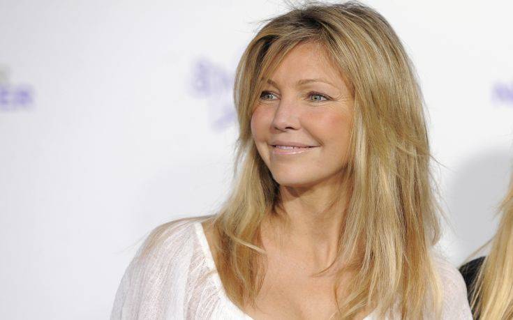 Heather Locklear and her daughter Ava Sambora arrive at the premiere of the documentary film "Justin Bieber: Never Say Never," in Los Angeles, Tuesday, Feb. 8, 2011. (AP Photo/Chris Pizzello)