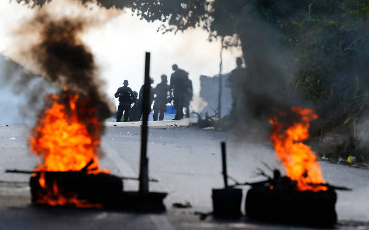 Αιματηρές ταραχές πριν από τις διαδηλώσεις στη Βενεζουέλα