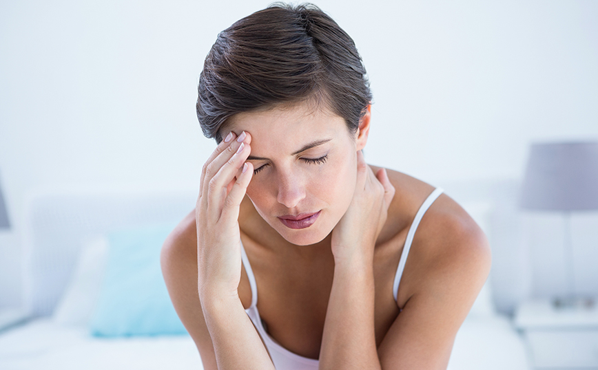 Γυναίκα που έχει πονοκέφαλο Γυναίκα που έχει πονοκέφαλο