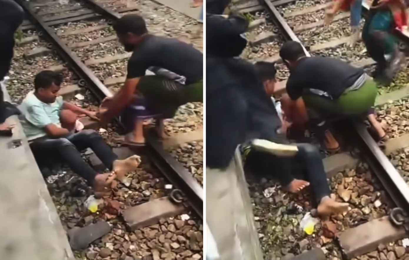 Βρέφος πέφτει στις ράγες και ο πατέρας του το καλύπτει για να το σώσει ενώ περνάει το τρένο από πάνω τους &#8211; Συγκλονιστικό βίντεο