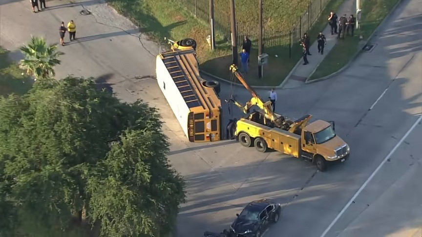 Ten students and two adults were injured when a car crashed into a school