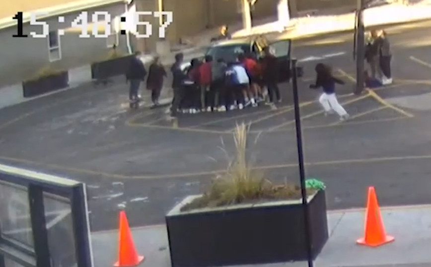 The shocking moment high school students lift a car to save a mother