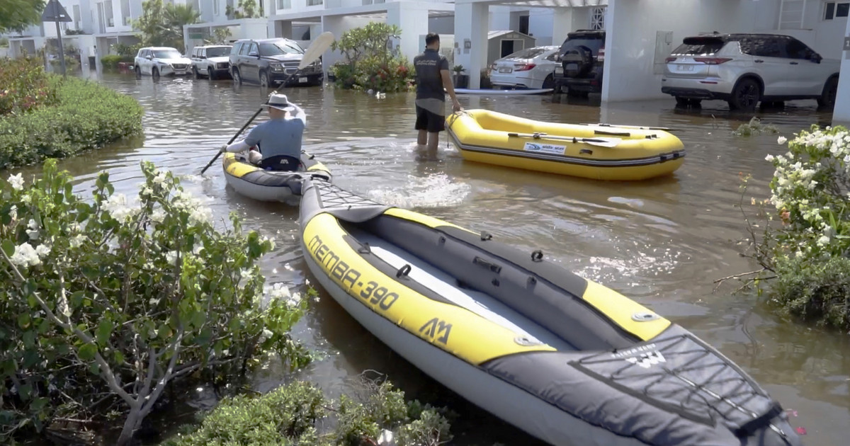 Rescuers evacuate houses by kayak in Dubai