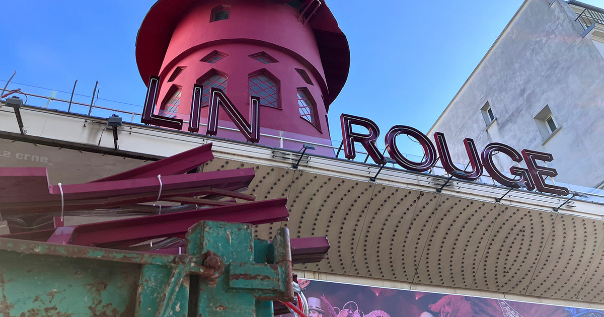The wings of the famous Moulin Rouge in Paris have fallen