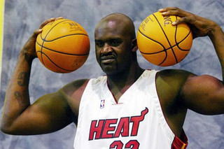 04-Shaq-Holding-Things