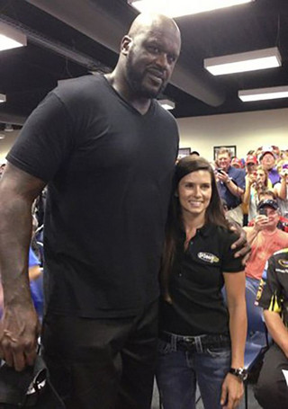 07-Shaq-Holding-Things