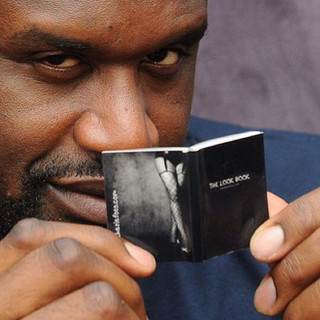 09-Shaq-Holding-Things