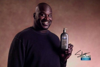 12-Shaq-Holding-Things