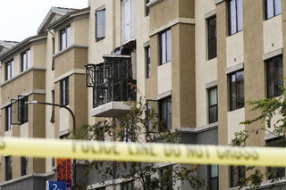 Damage is seen at the scene of a 4th-story apartment building balcony collapse in Berkeley, California