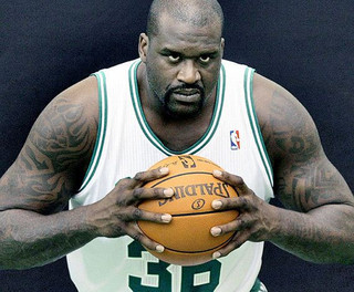 20-Shaq-Holding-Things