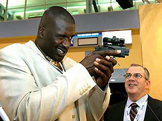 40-Shaq-Holding-Things