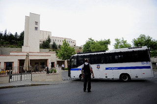 A Turkish police van arrives at the U.S. consulate building after an attack in Istanbul, Turkey, August 10, 2015. Two attackers opened fire on the U.S. consulate building in Istanbul on Monday while 10 people were injured in a car bombing at a police station overnight, weeks after Turkey launched what it described as a "synchronised war on terror". Police armed with automatic rifles cordoned off streets around the U.S. consulate in the Sariyer district on the European side of the city, following the gun attack there. Local media reports said two attackers, one man and one woman, fled after police fired back. There were no immediate reports of civilian injuries. REUTERS/Yagiz Karahan