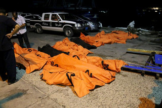 ATTENTION EDITORS - VISUAL COVERAGE OF SCENES OF DEATH OR INJURYA view of the bodies of dead migrants that were recovered by the Libyan coastguard after a boat sank off the coastal town of Zuwara, west of Tripoli, August 27, 2015. The boat packed with mainly African migrants bound for Italy sank off the Libyan coast on Thursday and officials said up to 200 might have died. Picture taken August 27, 2015.  REUTERS/Hani Amara TPX IMAGES OF THE DAY TEMPLATE OUT