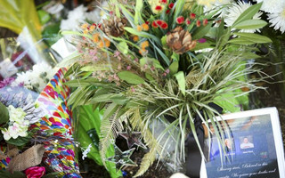 Flowers are seen at a memorial outside of the offices of WDBJ7 in Roanoke, Virginia