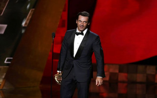 Jon Hamm accepts the award for Outstanding Lead Actor In A Drama Series for AMC's "Mad Men" at the 67th Primetime Emmy Awards in Los Angeles