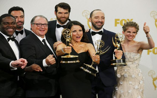 Cast members of HBO's "Veep" pose backstage during the 67th Primetime Emmy Awards in Los Angeles