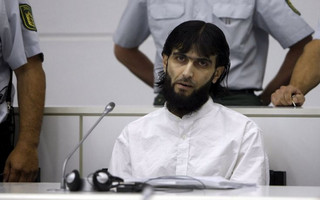 Iraqi defendant Rafik Y. awaits his verdict in a court room in Stuttgart Stammheim in this July 15, 2008 file photo. German police said on September 17, 2015 that they had shot dead a man they described as a convicted member of a terrorist group after he attacked a policewoman in western Berlin with a knife. German media identified the man as Rafik Y. In 2008, three men, including one named Rafik Mohamad Yousef, were convicted in Germany of hatching a plot to kill Iraqi prime minister Ayad Allawi during a visit to Berlin in 2004. REUTERS/Alex Grimm/Files ATTENTION EDITORS - BY REQUEST FROM THE GERMAN COURTS, THE FACE OF THE SUSPECT MUST BE PIXELISED. TEMPLATE OUT