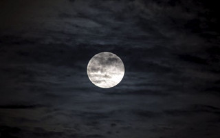 A supermoon, the last of this year's supermoons, is pictured in the sky in Managua