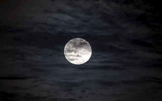 A supermoon, the last of this year's supermoons, is pictured in the sky in Managua